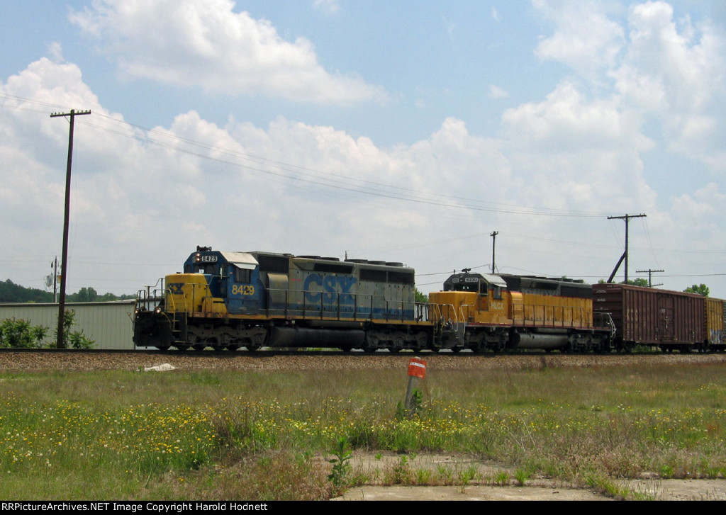 CSX 8429 leads a train towards the yard